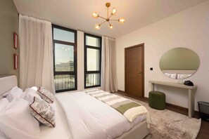 Coffres-forts dans les chambres, fer et planche à repasser