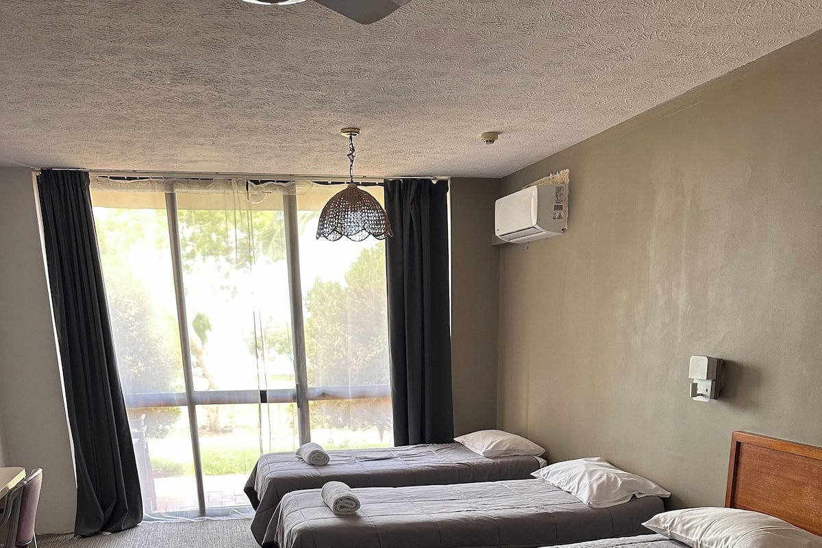 Family Triple Room, Patio, Beach View | Laptop workspace