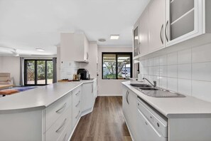 Fridge, microwave, oven, stovetop - Coastal 2-Bed Home with Pool (Safety Bay)