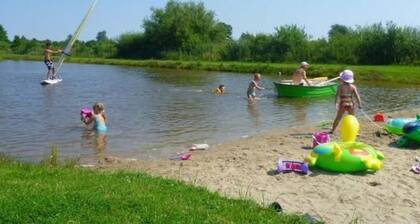 Blockhütte mit Terrasse und Grill by Interhome