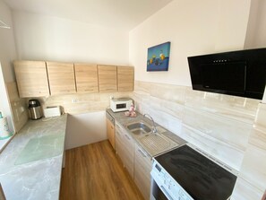 Fridge, microwave, oven, dishwasher - Nettes Ferienhaus in Miroszewo mit Großer Terrasse by Interhome (Nowe Warpno)