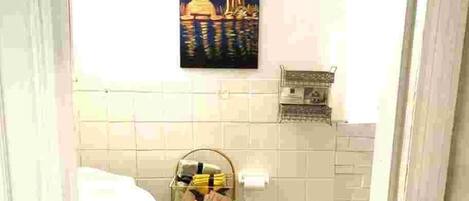 Shower, towels, soap, toilet paper