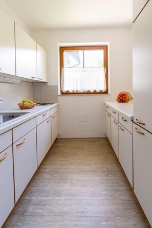 Fridge, microwave, oven, cookware/dishes/utensils