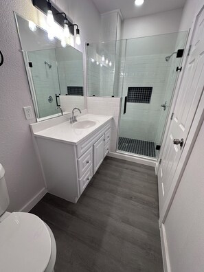 Hair dryer, towels, soap, toilet paper