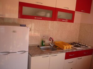 Fridge, microwave, oven, cookware/dishes/utensils - Apartment mit Balkon by Interhome (Marina)