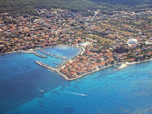 An aerial view of a coastal town with a marina, houses, and surrounding greenery. - Apartment im ersten Stock für bis zu 5 Personen by Interhome (Zadar/Bibinje)