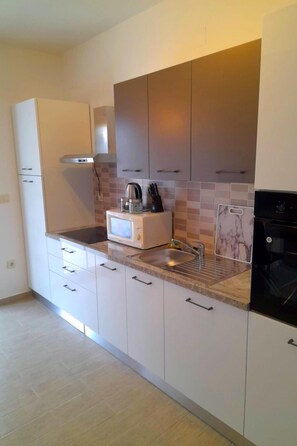 Fridge, microwave, oven, dishwasher