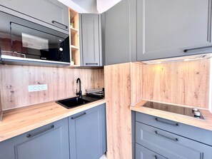 Fridge, microwave, oven, cookware/dishes/utensils