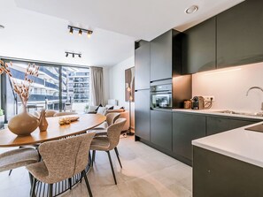 Fridge, dishwasher, cookware/dishes/utensils - Bel Air with parking and balcony by Interhome (Oostende)