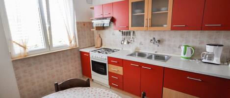 Fridge, microwave, oven, cookware/dishes/utensils