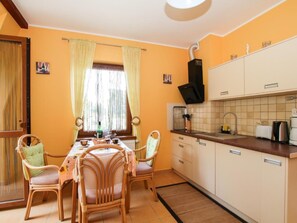 Fridge, cookware/dishes/utensils - Appartement in Rewal mit Grill und Garten by Interhome (Rewal)
