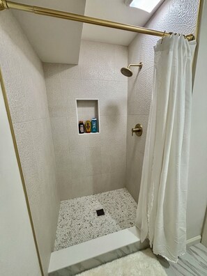 Hair dryer, towels, soap, toilet paper