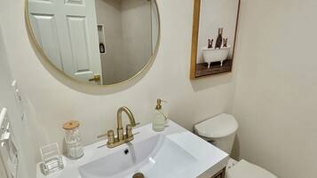 Hair dryer, towels, soap, toilet paper