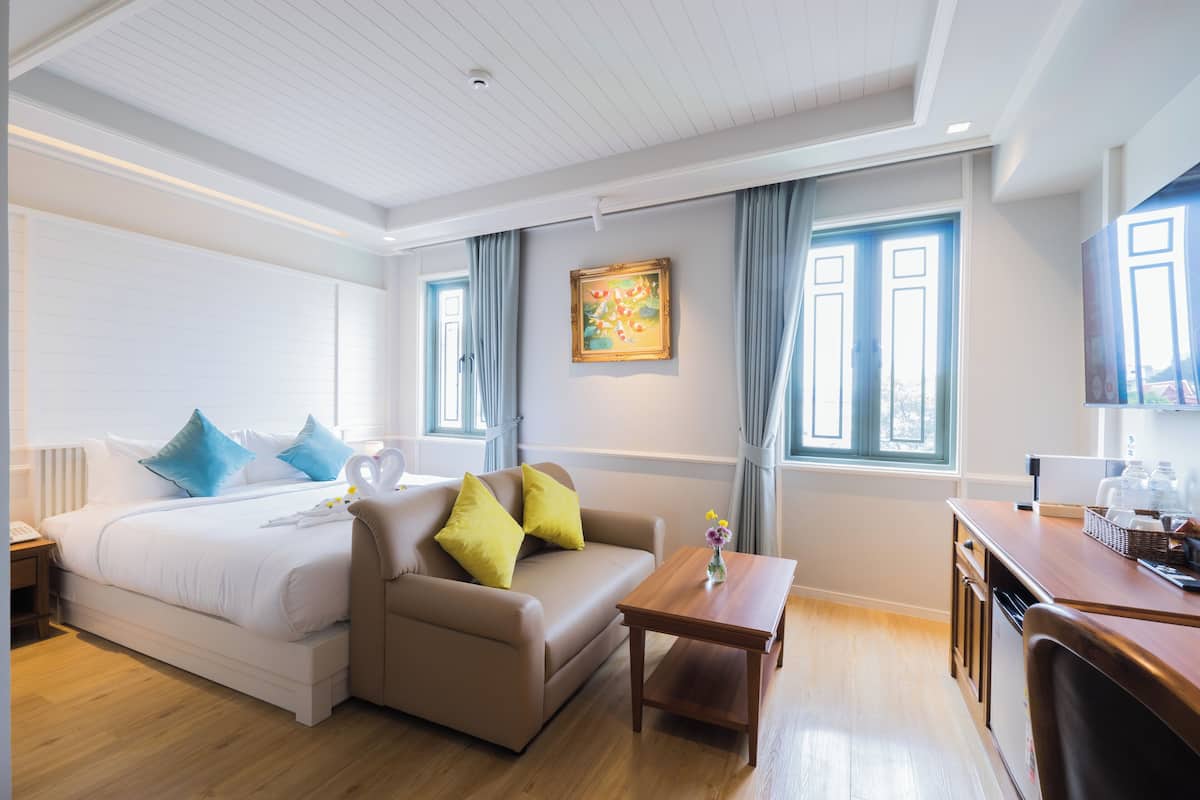 Executive suite, uitzicht op stad | Luxe beddengoed, een kluis op de kamer, een bureau