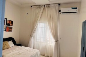 Room - Bytup 2Bedroom Apt in Lekki,24Hrs Light, Wifi ,Fully Serviced Apartment , Water Heater Smart tv (Ibeju)