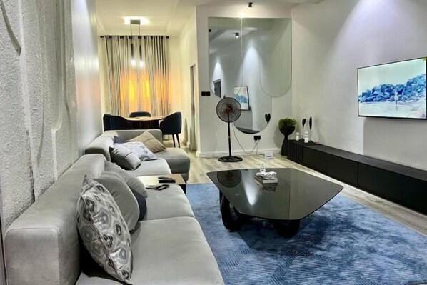 Living area - Bytup 2Bedroom Apt in Lekki,24Hrs Light, Wifi ,Fully Serviced Apartment , Water Heater Smart tv (Ibeju)