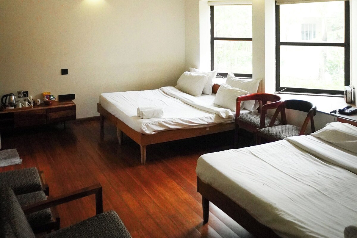 Family Room, Courtyard View | Down comforters, memory foam beds, in-room safe, laptop workspace