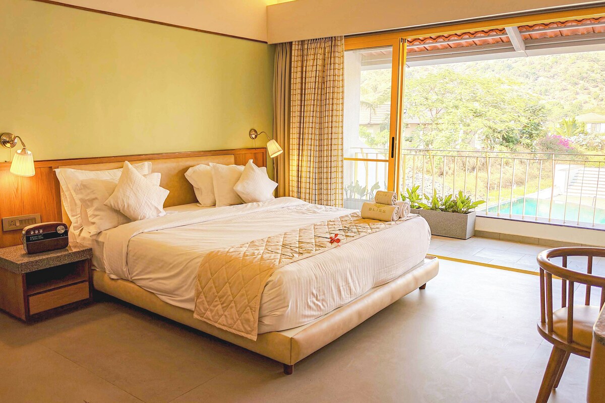 Down comforters, memory foam beds, in-room safe, laptop workspace