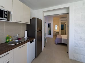 Apartamento (Magnolia Art Studio) | Cocina privada | Frigorífico y cafetera o tetera