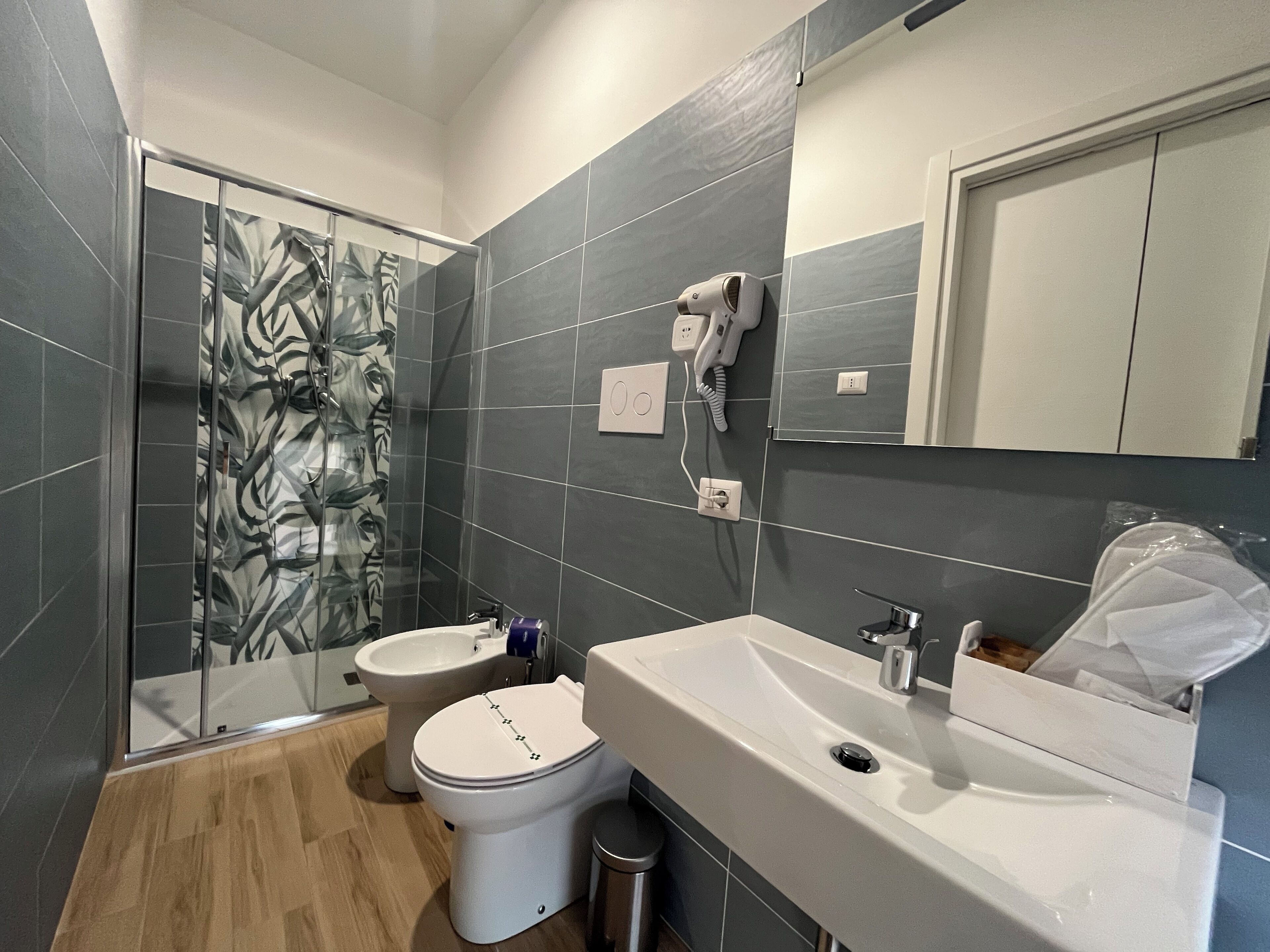 Standard Quadruple Room, Balcony, City View | Bathroom | Shower, hair dryer, towels, soap