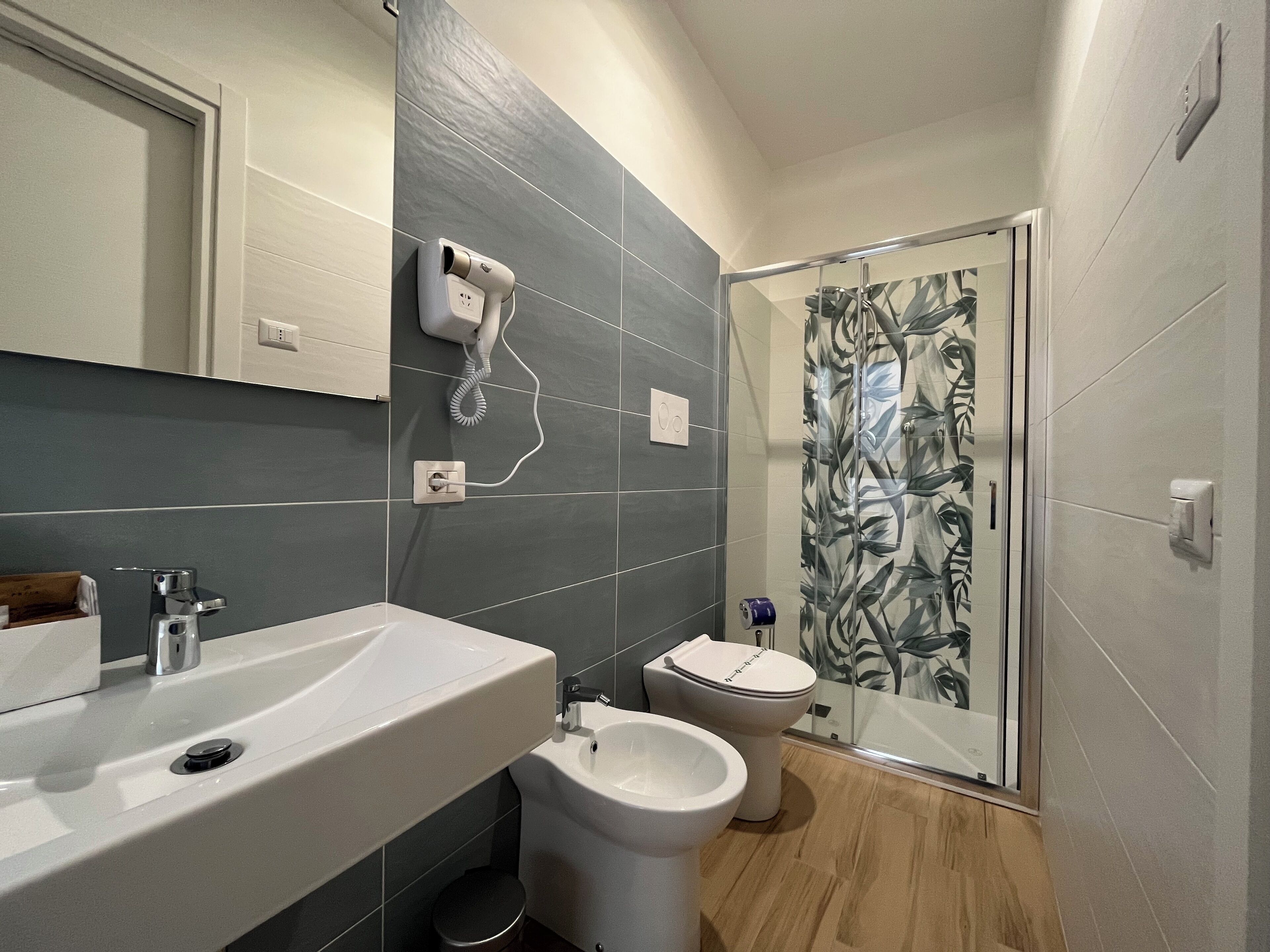 Superior Quadruple Room | Bathroom | Shower, hair dryer, towels, soap