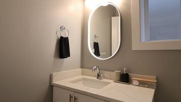 Hair dryer, towels, soap, shampoo