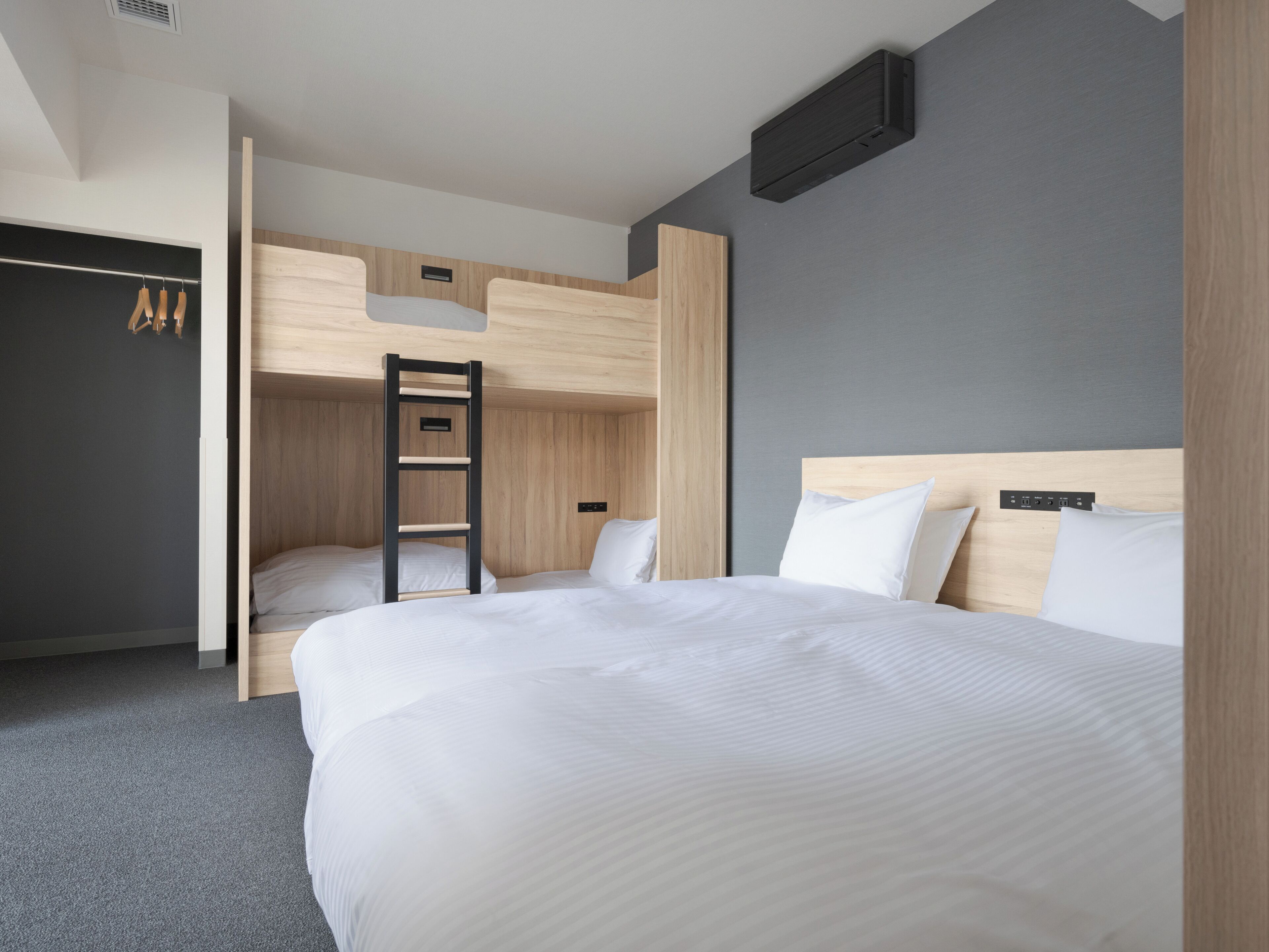 Two-Bedroom Family Apartment | Down comforters, in-room safe, free WiFi, bed sheets