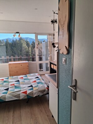 Tabla de planchar con plancha y acceso para silla de ruedas