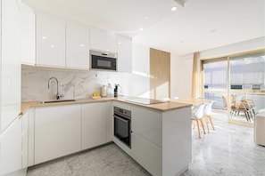Appartamento | Cucina privata | Frigorifero, microonde, forno, piano cottura