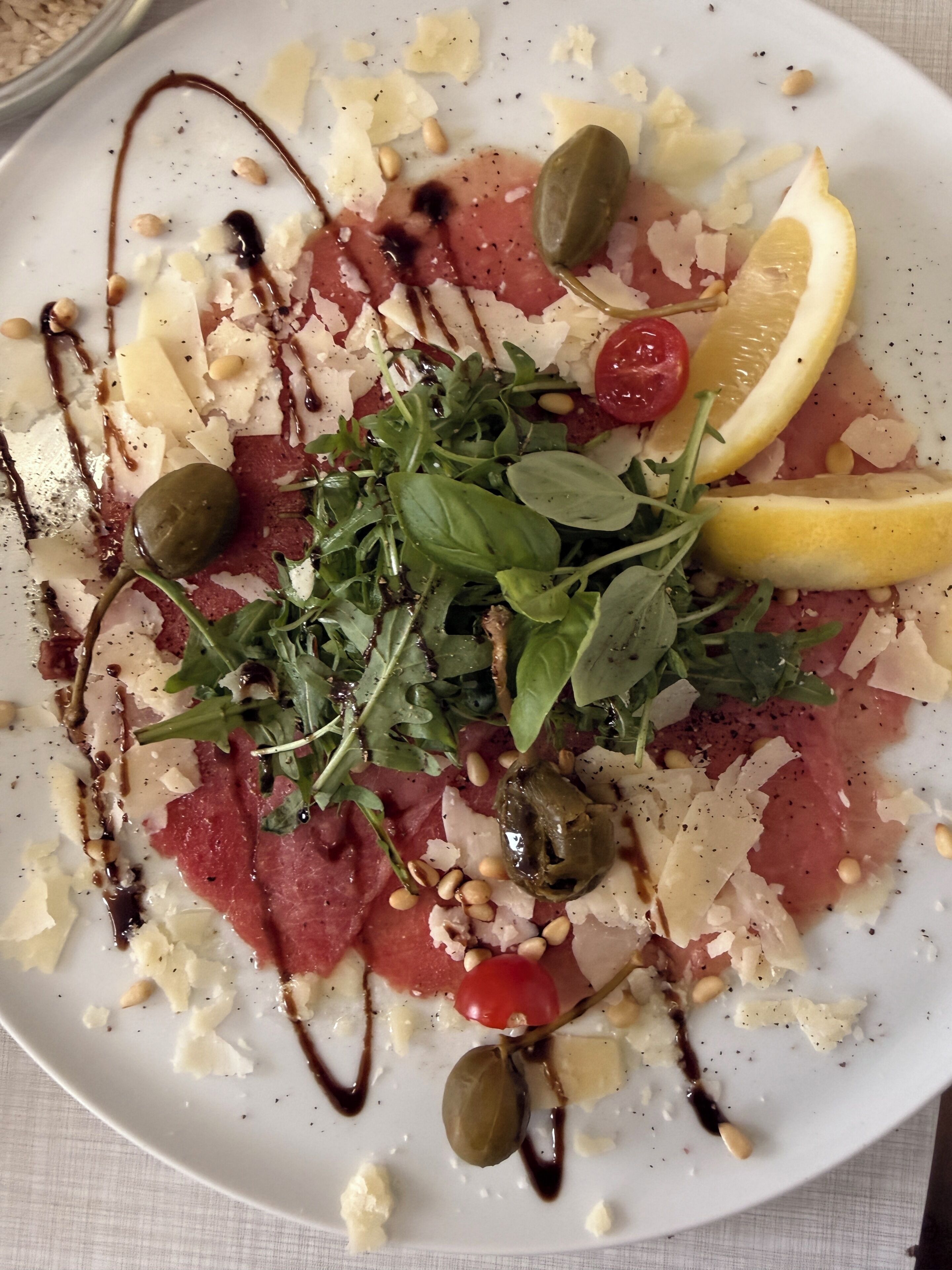 A plate of food with various toppings and garnishes.