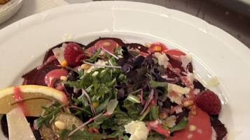 A plate of food with various toppings.