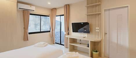 Chambre Supérieure avec lits jumeaux | Rideaux occultants, Wi-Fi gratuit, draps fournis