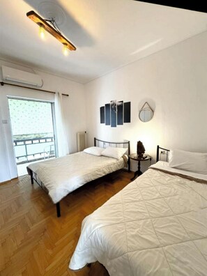 2 chambres, fer et planche à repasser, Wi-Fi, draps fournis
