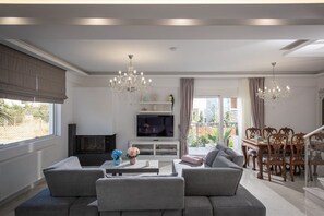 TV, fireplace - Villa Ira | Luxury 3BR Getaway (Hersonissos)