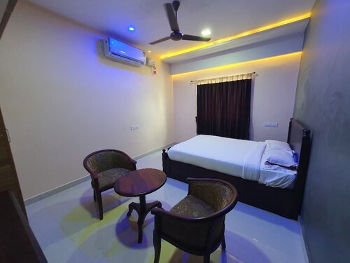 Kousthubam Residency provides comfortable rooms for a calm and relaxing stay