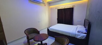 Kousthubam Residency provides comfortable rooms for a calm and relaxing stay