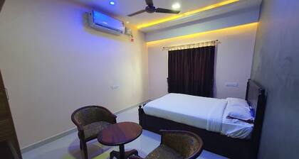 Kousthubam Residency provides comfortable rooms for a calm and relaxing stay