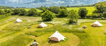 Glamping accommodation in Norfolk, Blancas Bell Tents sleeps up to 20 people.