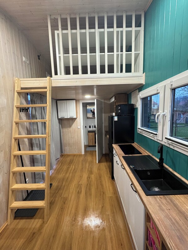 Fridge, microwave, stovetop, coffee/tea maker