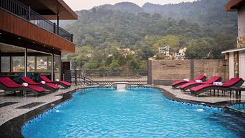 Outdoor pool, open 10:00 AM to 7:00 PM, sun loungers