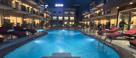 Outdoor pool, open 10:00 AM to 7:00 PM, sun loungers