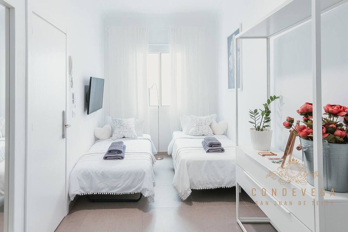 Family Quadruple Room, Patio, Courtyard View | Down comforters, blackout drapes, iron/ironing board, WiFi (free)