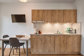 Private kitchen - Apartment Penegal, Residence La Terrazza. Experience South Tyrol in Kaltern. central (Kaltern)