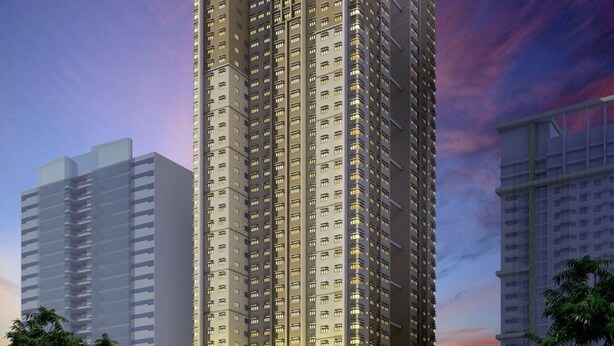 A high-rise building with multiple floors, large windows, and a modern architectural design. - Charming, Comfy and Stylish Condo Stay! (Makati City)