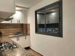 Private kitchen - Appart Élégant a Kenitra prêt de la Gare TGV (Kenitra)