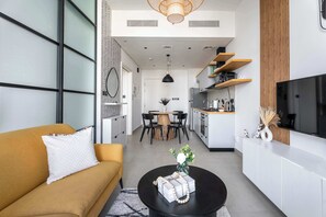 TV - Stylish 1BR w/ Balcony | Collective Tower 2.0 (Dubai Hills)