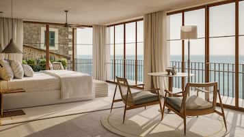 Deluxe Suite, Sea View | Premium bedding, minibar, in-room safe, individually decorated