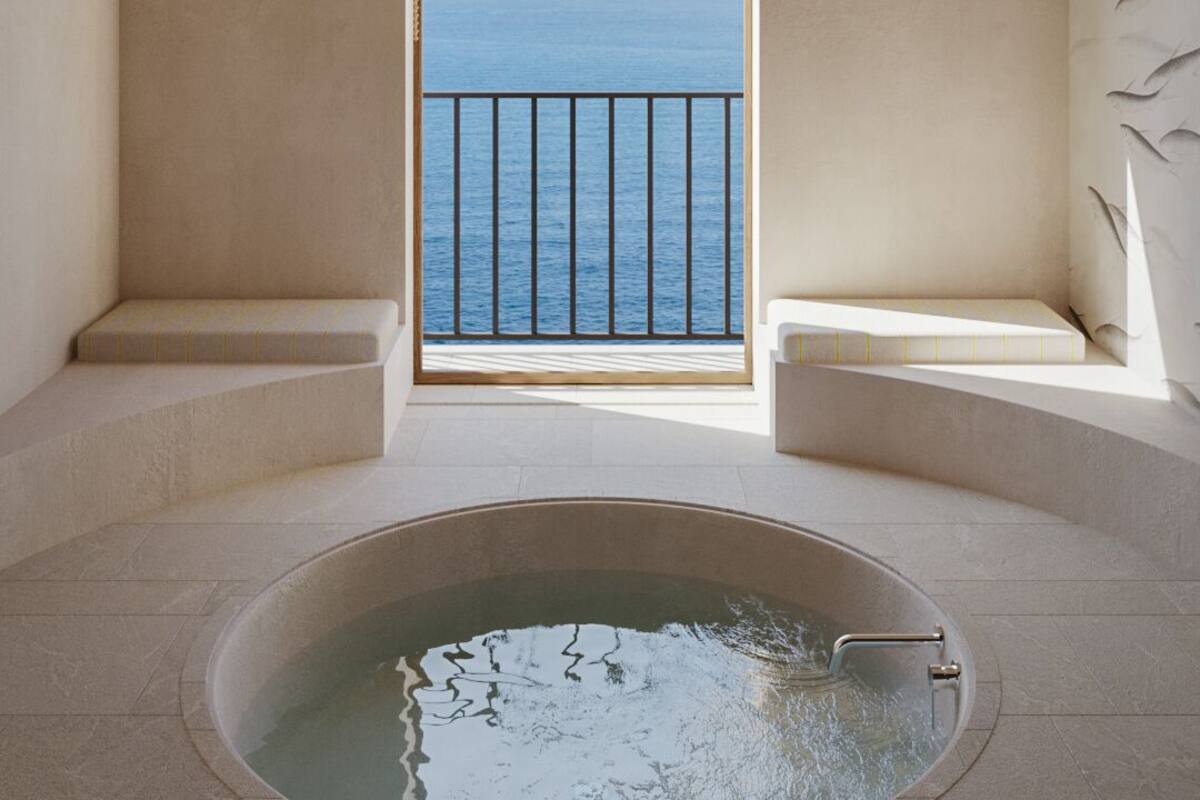 Deluxe Suite, Sea View | Premium bedding, minibar, in-room safe, individually decorated