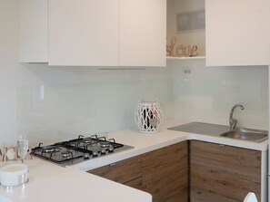 Fridge, microwave, cookware/dishes/utensils