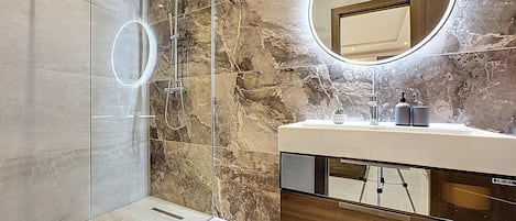 Shower, free toiletries, hair dryer, towels